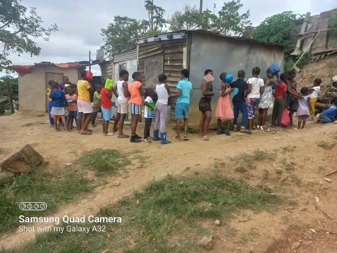 Pupils enjoying a meal provided through OTEGA Foundation education support